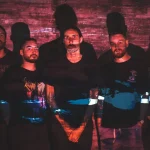 discovery through torment band photo